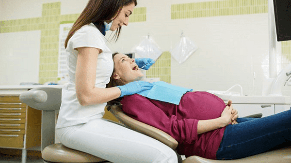 Nhổ răng khôn khi mang thai có an toàn không
