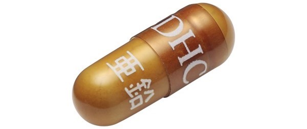 Viên uống có hình con nhộng, in tên thương hiệu “DHC” và kẽm bằng tiếng Nhật “亜鉛”